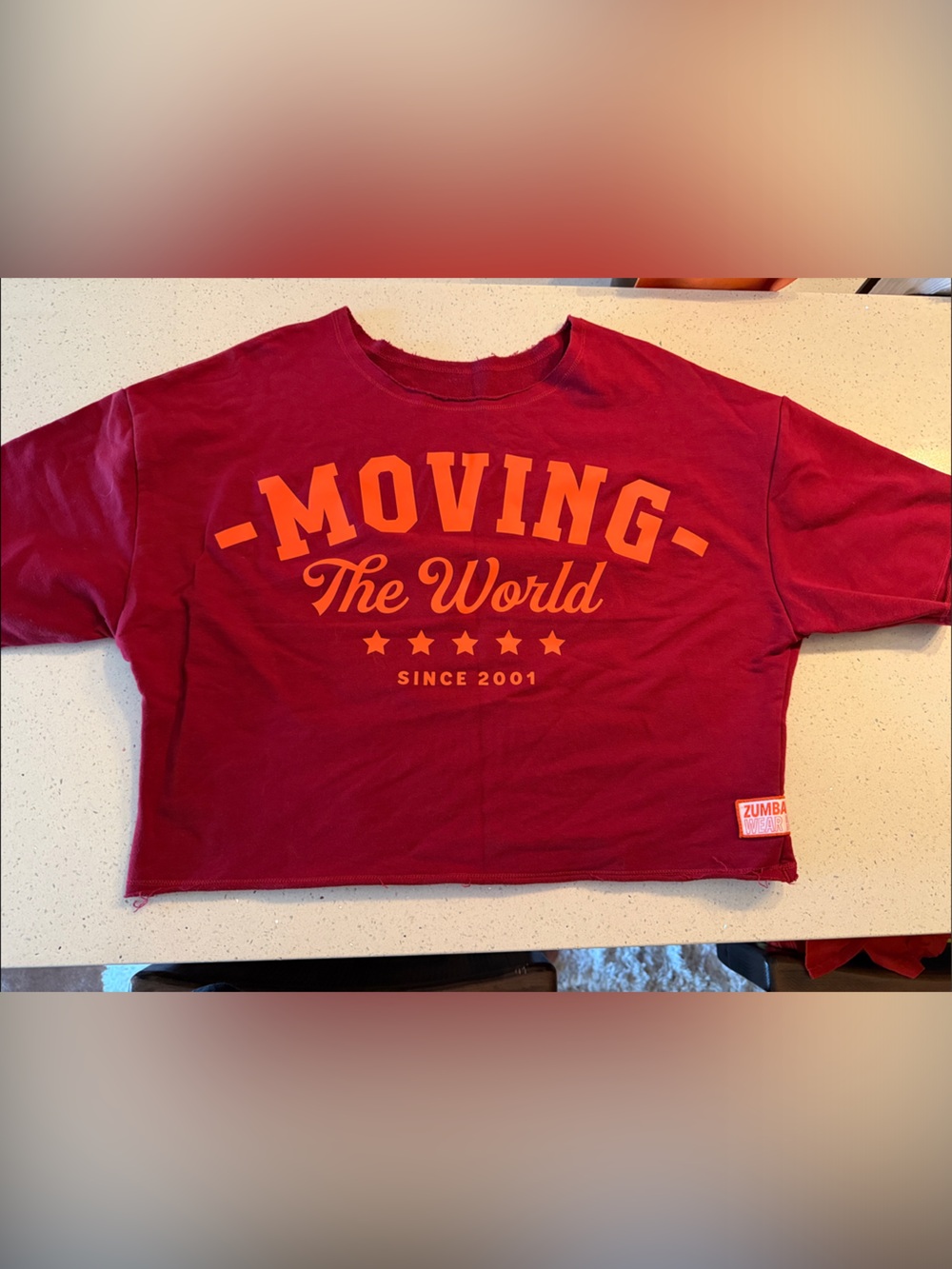 Zumba Fitness Oversized Red Tee with Orange "Moving The World" Graphic